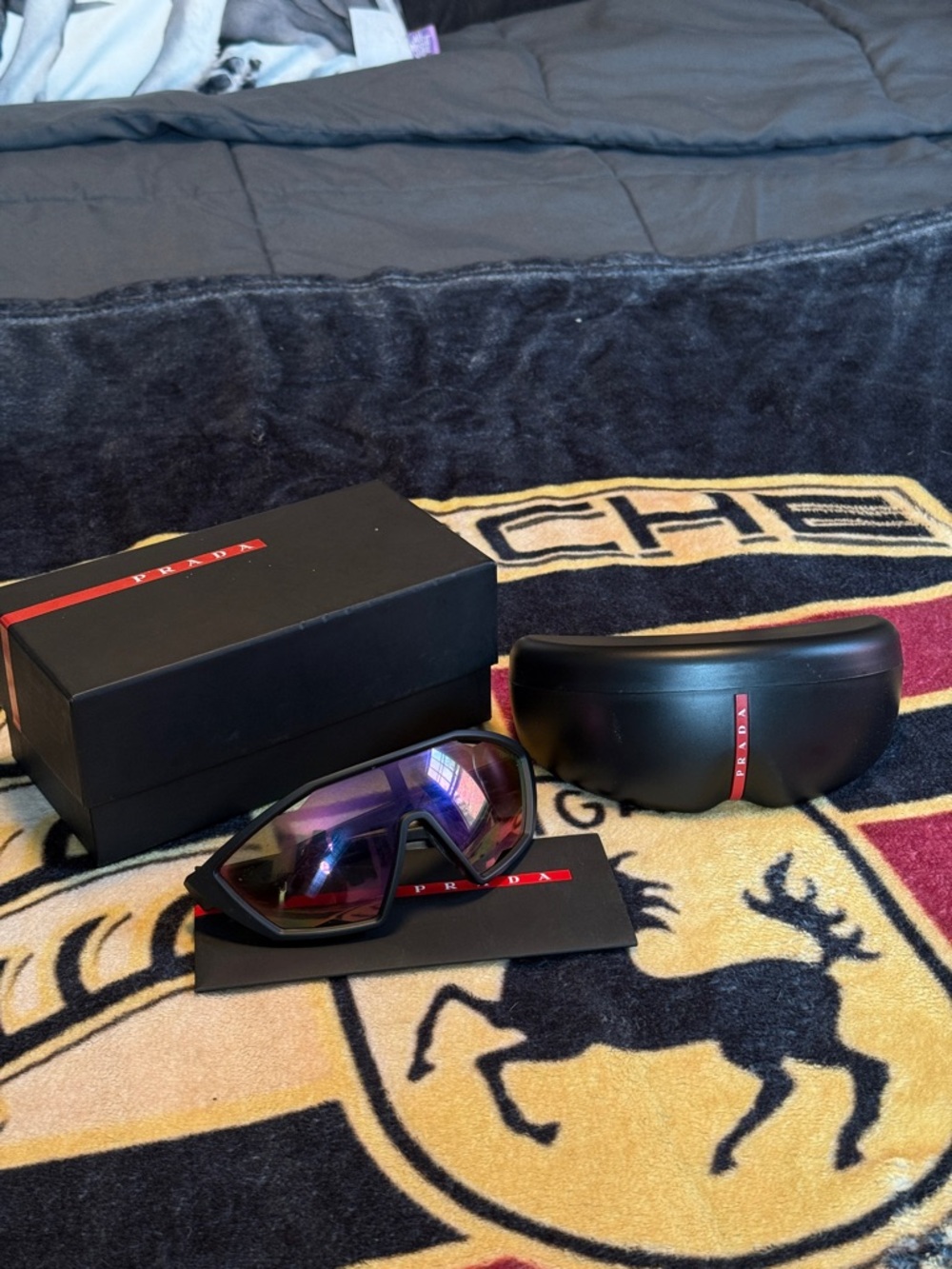 Prada Black Sunglasses with Purple Mirrored Lenses